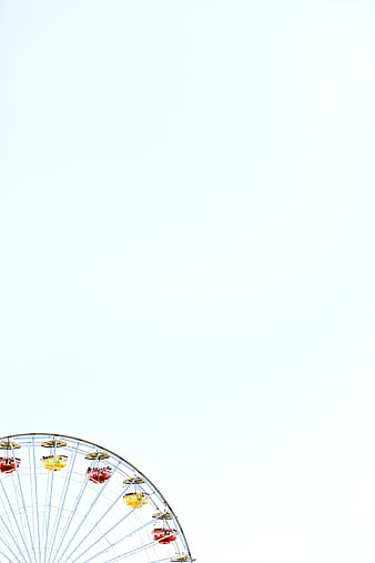 Ferris Wheel Against White Sky with Copyspace
