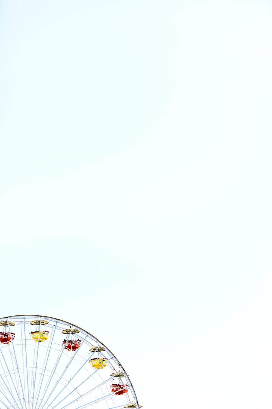 Ferris Wheel Against White Sky with Copyspace