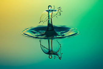 Abstract Water Drop Splash with Reflection on Gradient Background