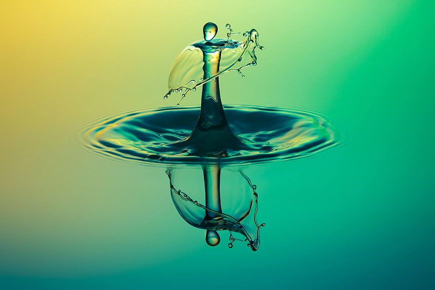 Abstract Water Drop Splash with Reflection on Gradient Background