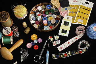 Vintage Sewing Supplies Flat Lay on Black Background
