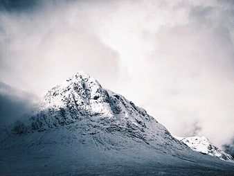 Majestic Snow-Capped Mountain Peak in Winter