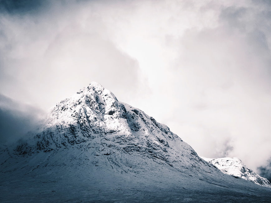 Majestic Snow-Capped Mountain Peak in Winter