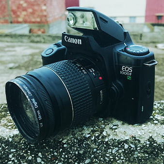 Vintage Canon EOS 1000F Film Camera on Concrete