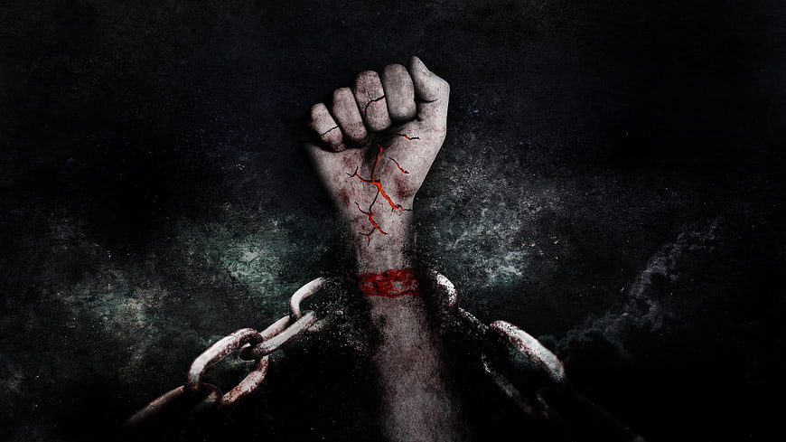 Fist Breaking Chains Symbolizing Freedom and Rebellion