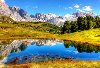 Alpine Lake Reflection with Majestic Mountain Peaks