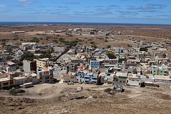 Aerial View of Coastal Town in Arid Landscape