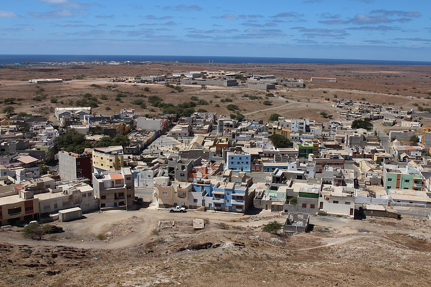 Aerial View of Coastal Town in Arid Landscape