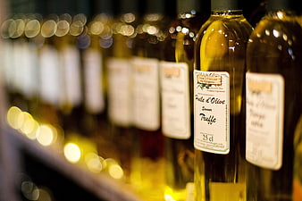 Close-up of Gourmet Truffle Olive Oil Bottles on Shelf