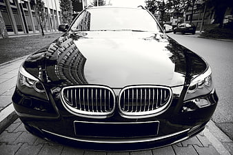 Front View of Black BMW Station Wagon in Black and White