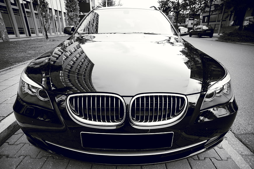 Front View of Black BMW Station Wagon in Black and White
