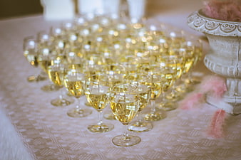 Rows of champagne glasses on a wedding table