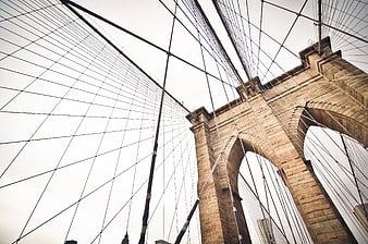 Low Angle View of Brooklyn Bridge Towers and Cables