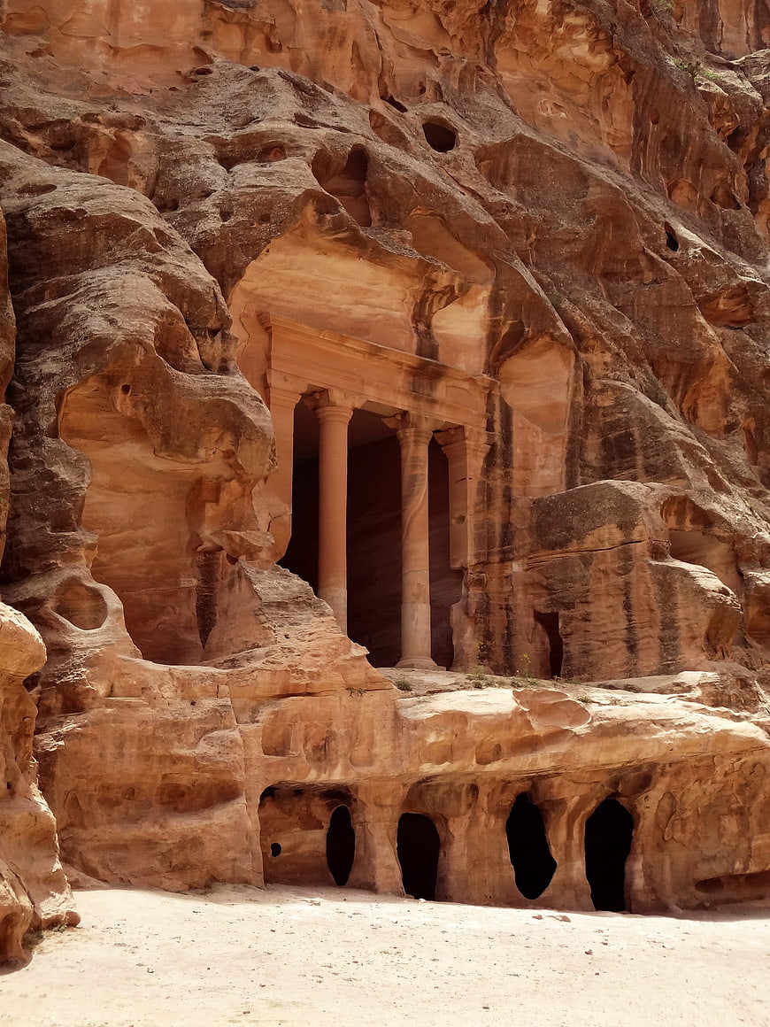 Ancient rock-cut tomb facade in Petra, Jordan