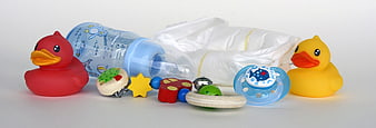 Baby Essentials Still Life With Rubber Ducks And Diapers