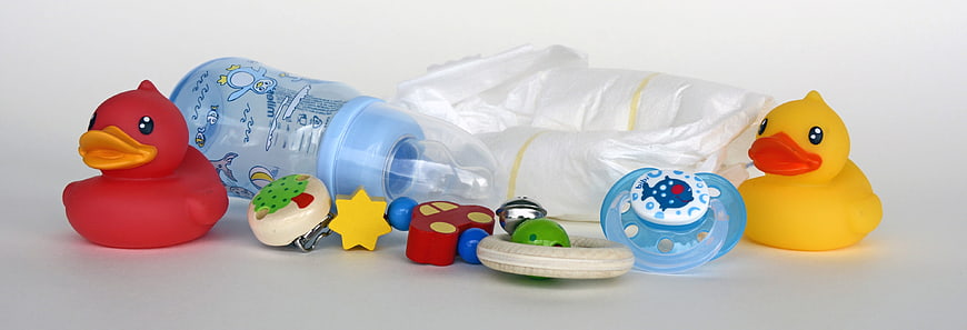 Baby Essentials Still Life With Rubber Ducks And Diapers