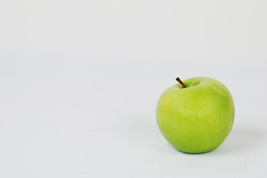Single Green Apple On White Background