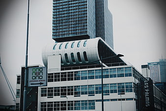 Modern White Office Building with Unique Cylindrical Architecture