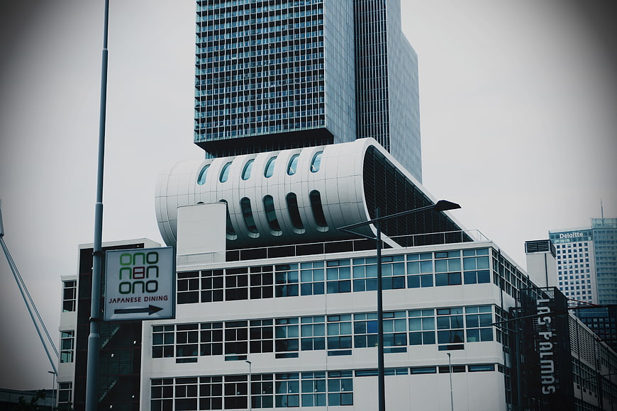 Modern White Office Building with Unique Cylindrical Architecture