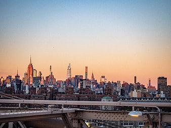 Manhattan Skyline at Sunset from Brooklyn Bridge
