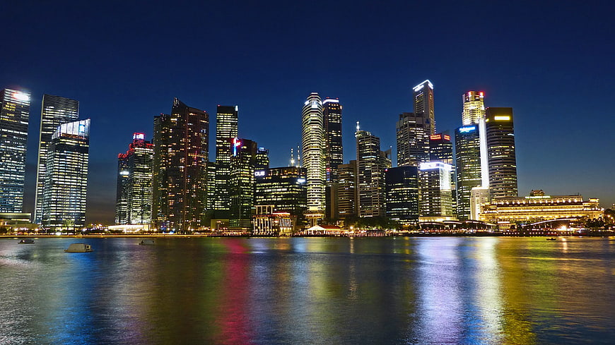 Singapore Skyline at Night with Water Reflections