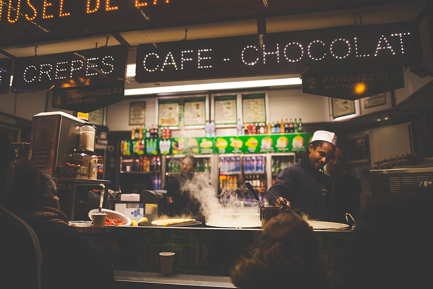 Chef Making Crepes at Night Market Food Stall