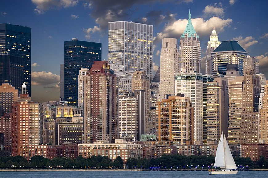 Manhattan Skyline at Dusk with Sailboat on Hudson River