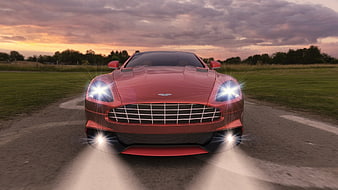 Red Aston Martin Vantage Front View On Country Road At Sunset