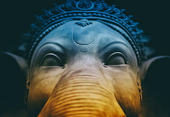 Close-up of Ganesha Statue with Blue and Gold Details