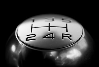 Close-up of a 5-speed manual gear shift knob