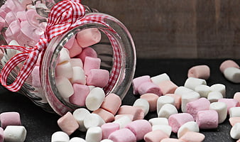 Spilled Pink and White Mini Marshmallows from Glass Jar