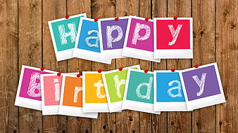 Happy Birthday Polaroid Photos on Wooden Background