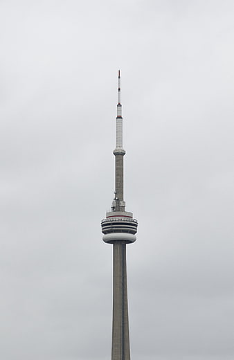 CN Tower Top Section Against Overcast Gray Sky