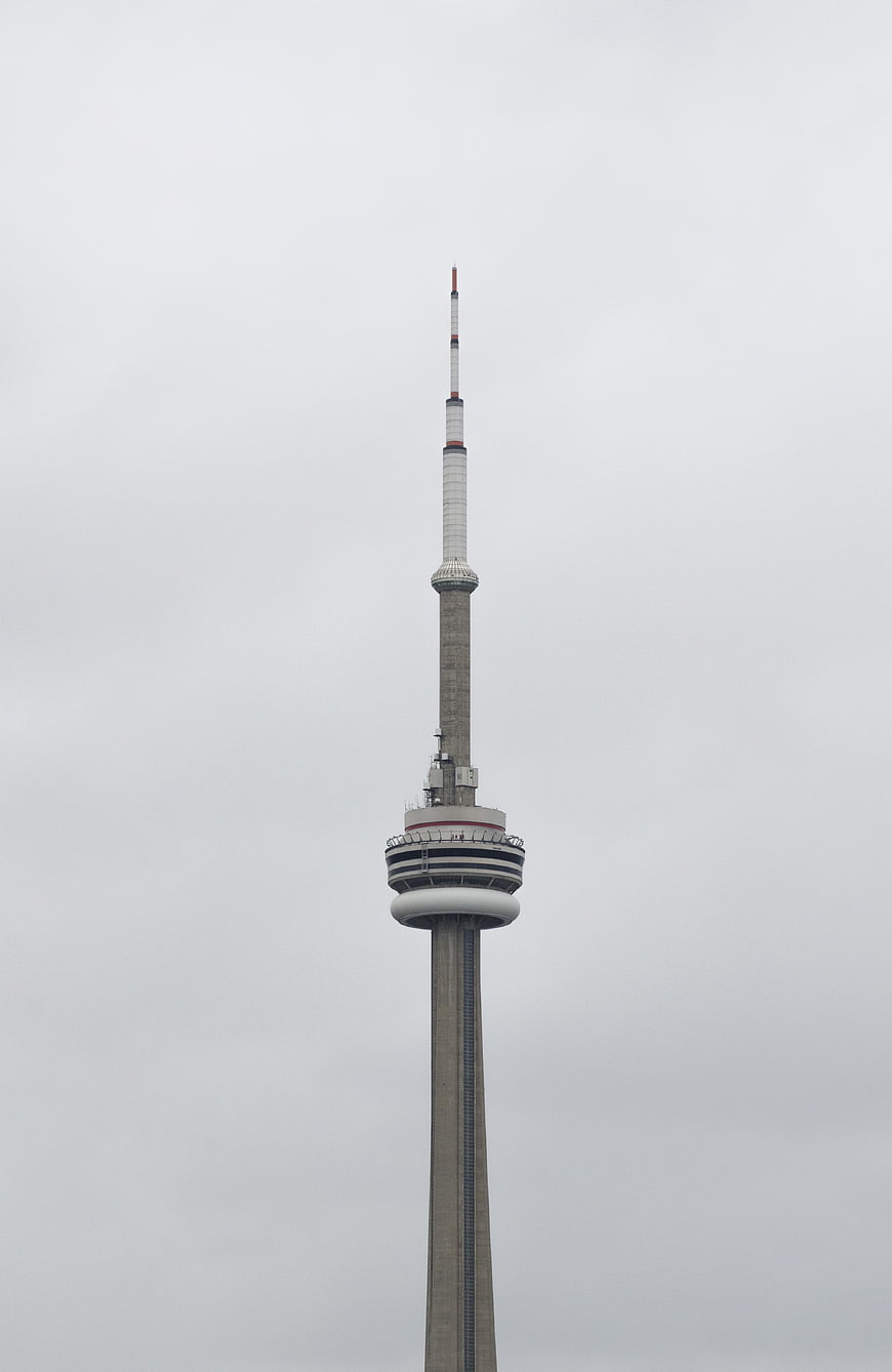 CN Tower Top Section Against Overcast Gray Sky