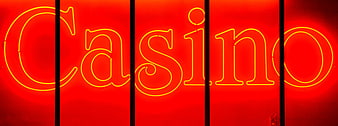 Red Neon Casino Sign With Yellow Lettering