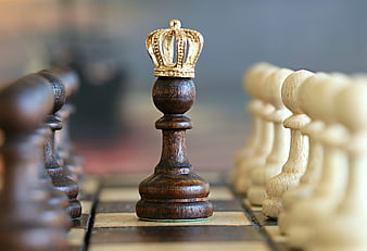 Crowned Chess Pawn Symbolizing Strategy and Leadership