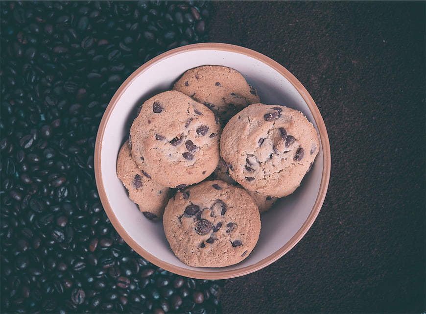 Top View of Chocolate Chip Cookies in Bowl with Coffee Beans