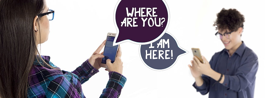 Young couple texting on smartphones with speech bubbles