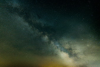 Milky Way Galaxy Night Sky with Stars and Clouds