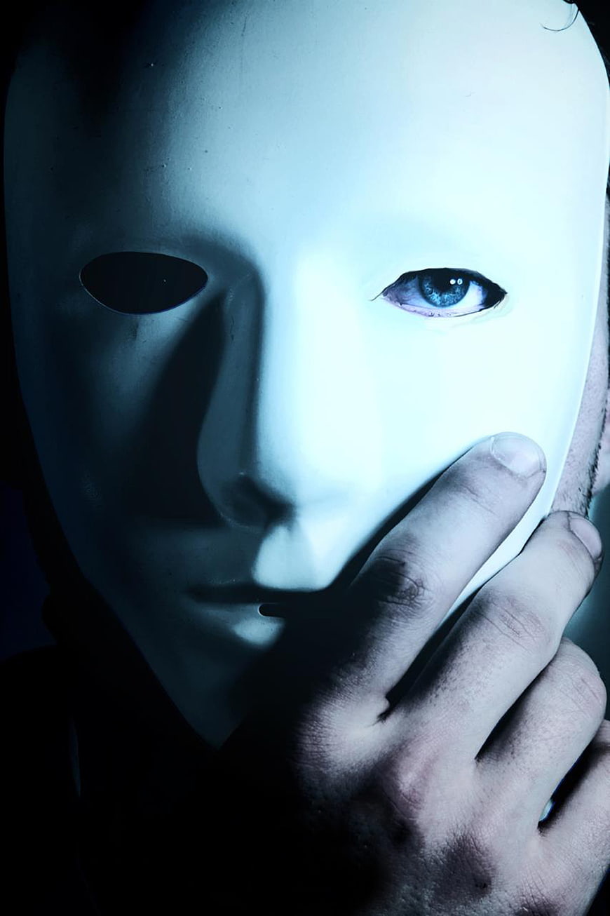 Man Wearing White Mask with One Blue Eye Visible