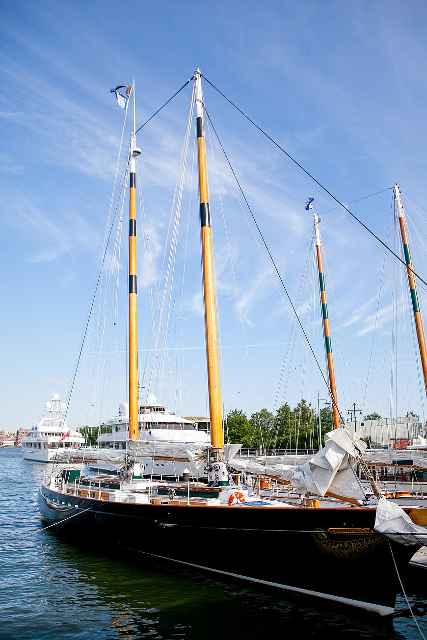 Classic Wooden Sailboats Docked in Harbor