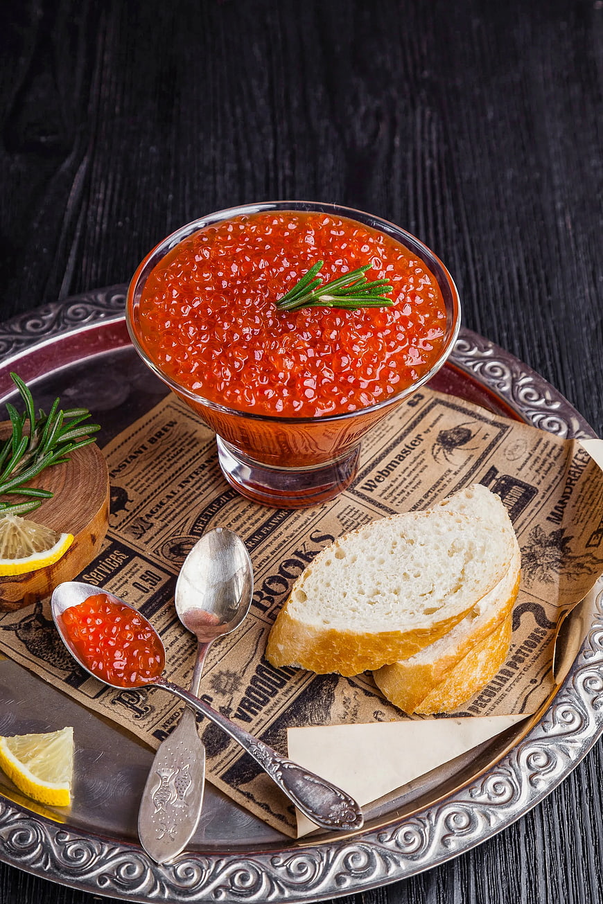 Gourmet Red Caviar with Bread and Lemon on Silver Tray