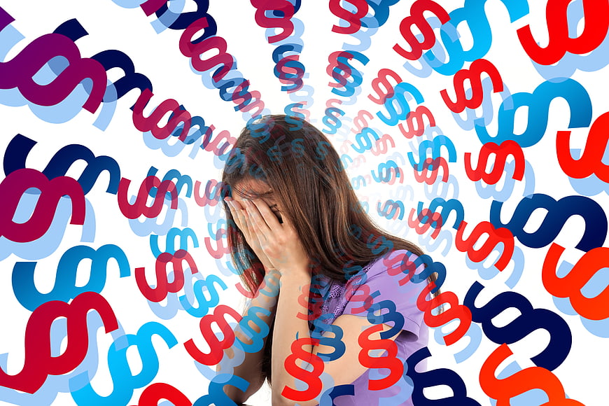 Woman overwhelmed by flood of dollar signs and financial stress