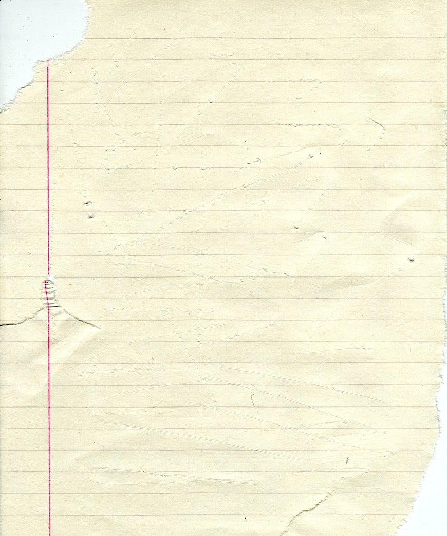 Textured Ripped Legal Pad Paper Background