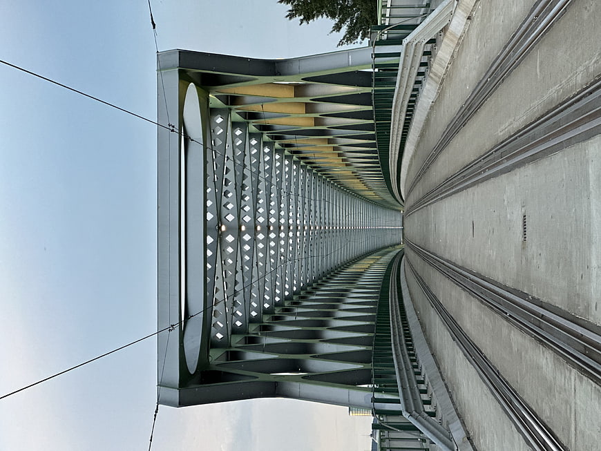 Low angle view of modern steel railway bridge structure
