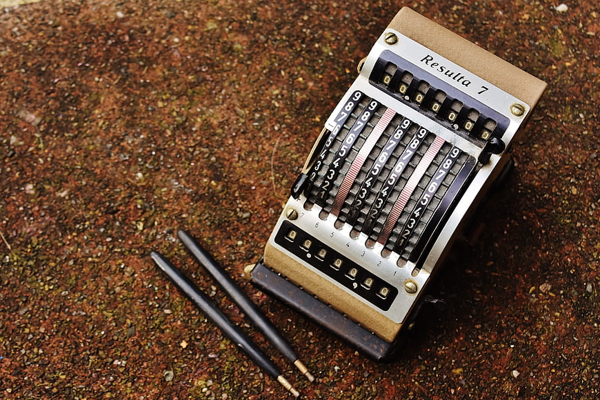 Vintage Resulta 7 Mechanical Calculating Machine On Textured Ground