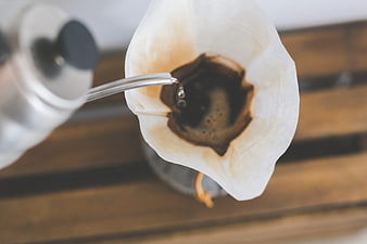 Pour-over coffee brewing in Chemex filter