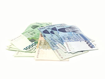 Korean Won Banknotes on White Background