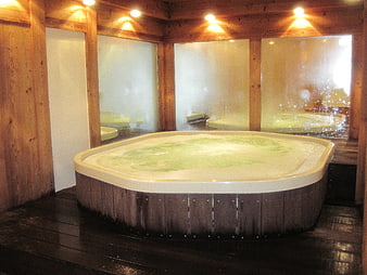 Wooden Hot Tub in Steamy Spa Interior