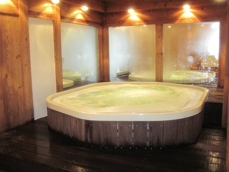 Wooden Hot Tub in Steamy Spa Interior